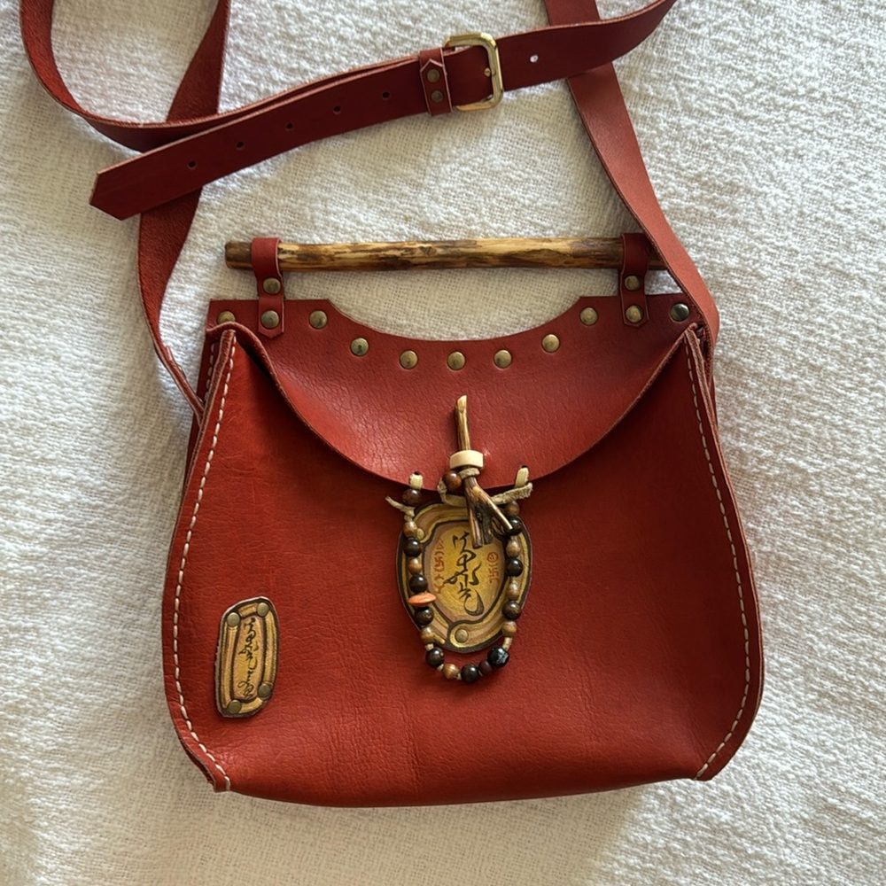 Mongolian leather bag with wooden handler